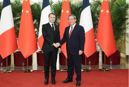 李强会见法国总统马克龙